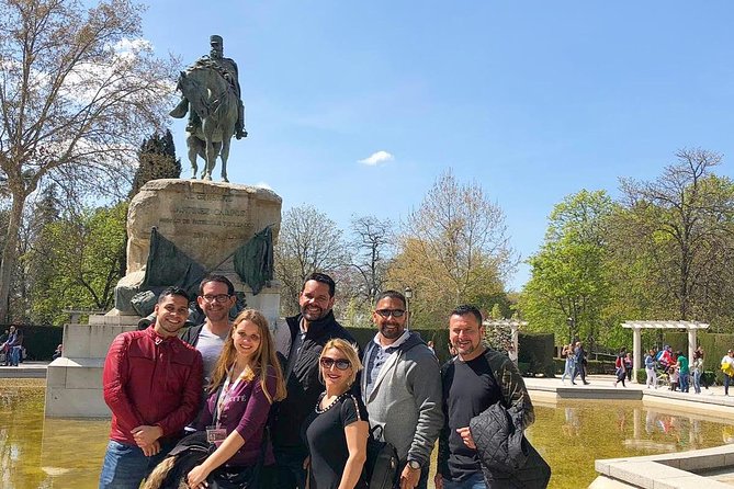 Madrid: El Retiro Park Guided Tour and Tapas - Puerta de Alcalá: The Right Beginning for First-Time Madrid