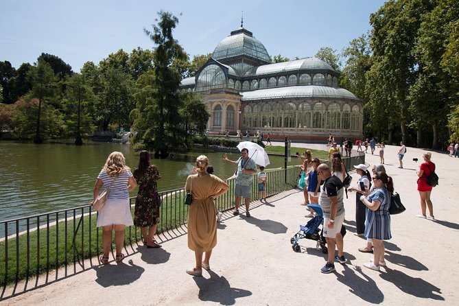 Madrid: El Retiro Park Guided Tour and Tapas - Retiro Park Guided Walk: What You Gain Without a Map