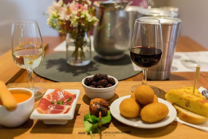 Madrid Food Tour - Tapas Walking Tour - How the tour stays smooth: meet point, group size, and hotel pickup