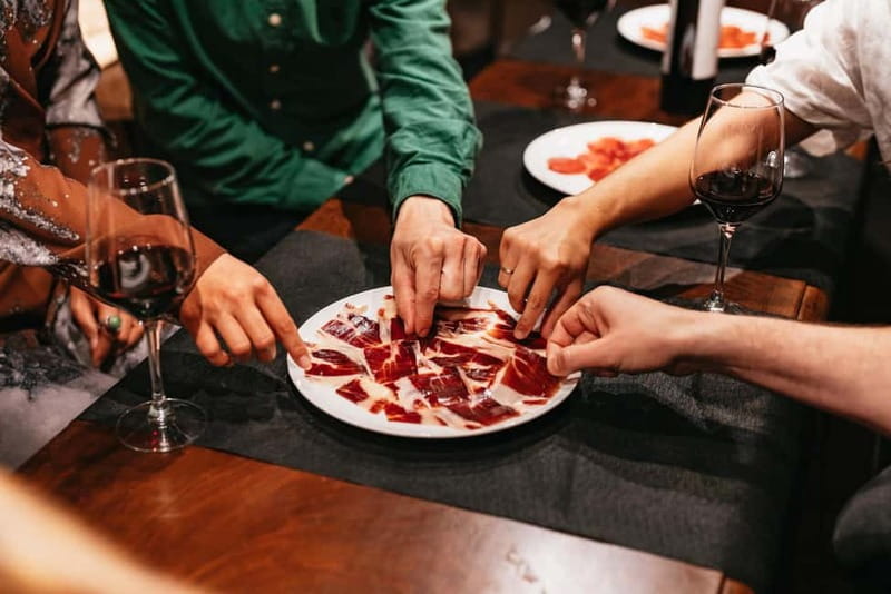 Madrid: Guided Tapas and Wine Tour with Rooftop Views - Carrilleras time in an old renovated bar