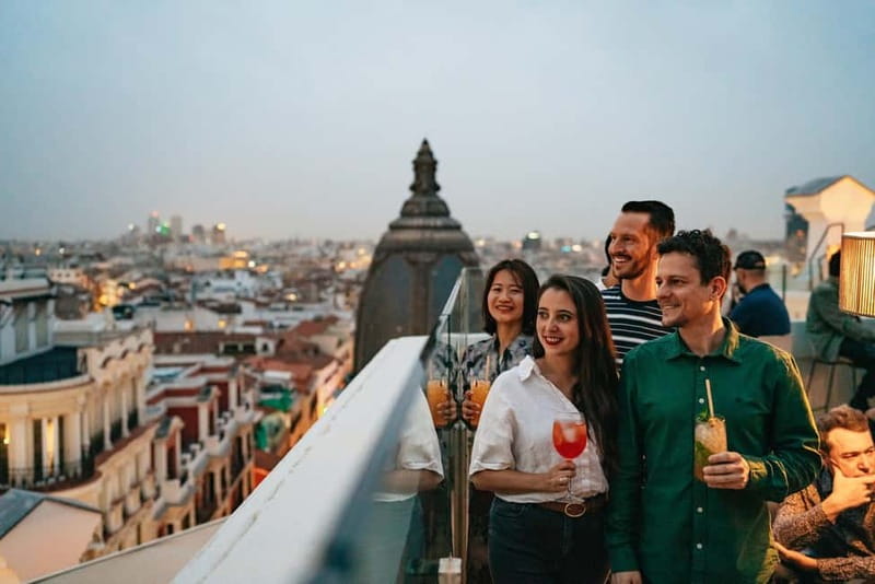 Madrid: Guided Tapas and Wine Tour with Rooftop Views - Start at Plaza de San Miguel: the launch point that sets the tone
