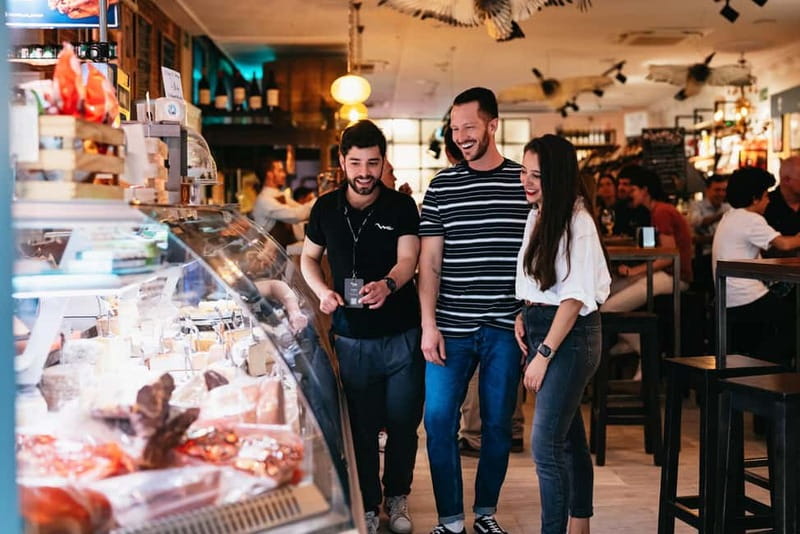 Madrid: Guided Tapas and Wine Tour with Terrace Visit - The neighborhoods you’ll walk through: Las Letras, La Latina, Los Austrias