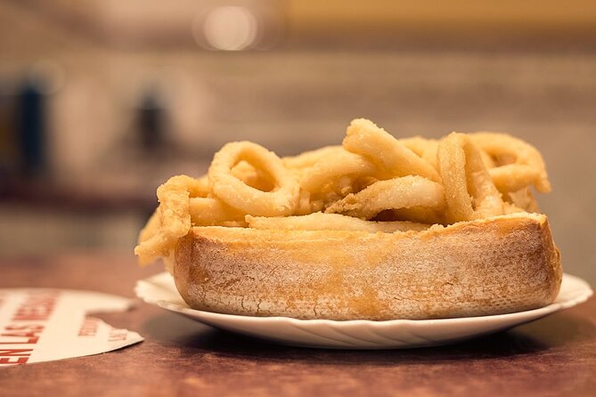 Madrid Historic Centre Food Tour with Authentic Tapas & Wines - The walking route: Plaza Mayor, Km 0, and a central market vibe