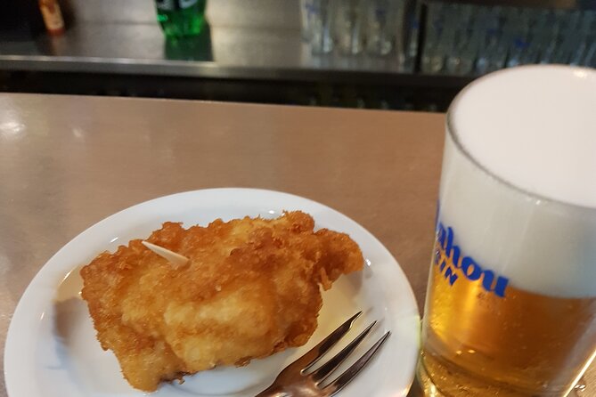 Madrid History Food Tour: Tapas & Drinks Tasting - Croquetas, Empanadilla, and Fried Bacalao with Cold Beer