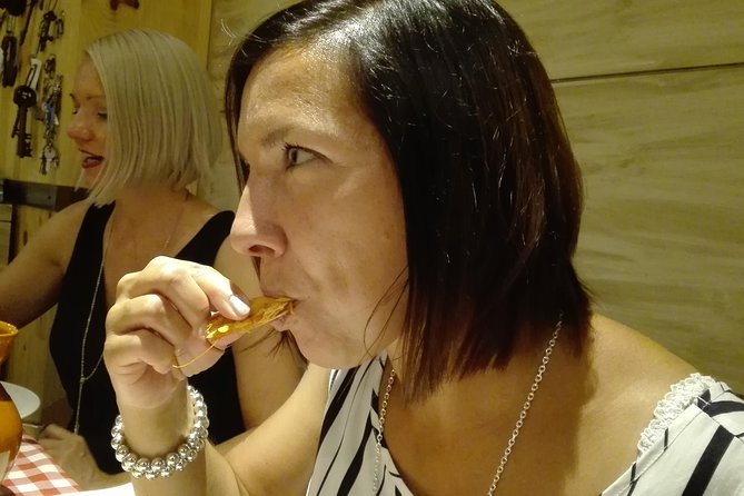 Madrid Local's Tapas Tour Dinner with a side of History - Puerta del Sol: Madrid’s time-square stories and the 12 grapes moment
