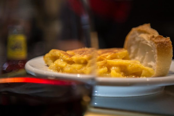 Madrid Local's Wine and Tapas Lunch Tour with a side of History - Croquetas and Spanish wine: where the story starts