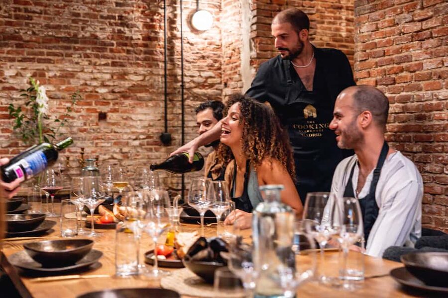 Madrid: Tapas Cooking Class with bottomless Wine Pairing - Quick Highlights