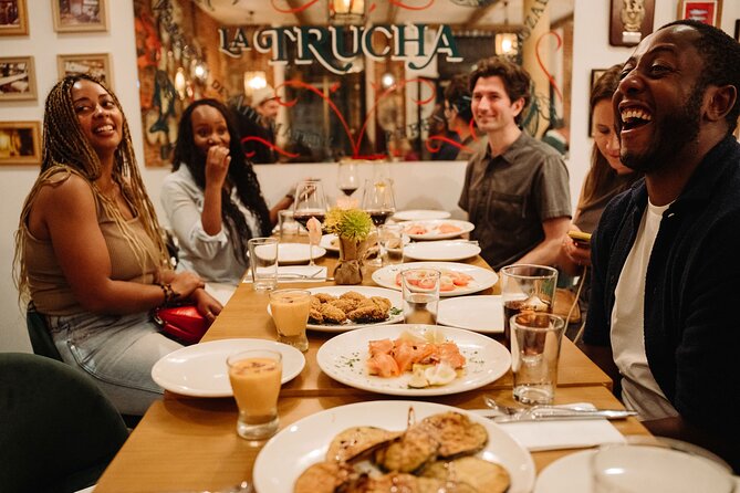 Madrid Tapas & Taverns Small Group Food & History Tour - The walking history stretch: Royal Palace area and the Habsburg neighborhood