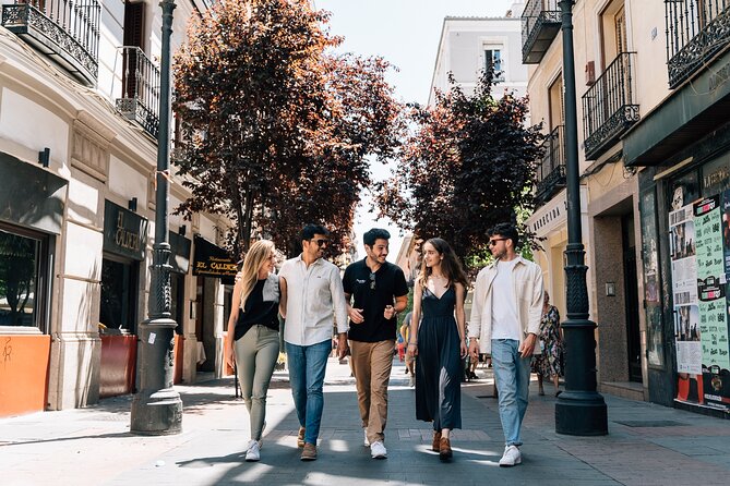 Madrid Tapas & Wine Tour with Rooftop Views and Local Guide - Plaza Mayor and Barrio de las Letras: Ham and Wine in Poet Territory