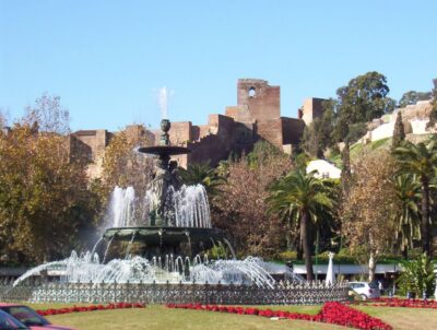 Malaga: City Center Walking Tour with Tapas Food Tastings - Calle Granada and Iglesia de Santiago: Old Streets, Clear Stories