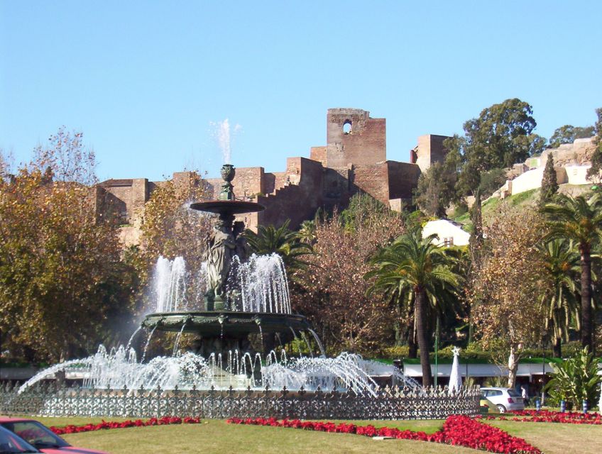 Malaga: City Center Walking Tour with Tapas Food Tastings - Calle Granada and Iglesia de Santiago: Old Streets, Clear Stories