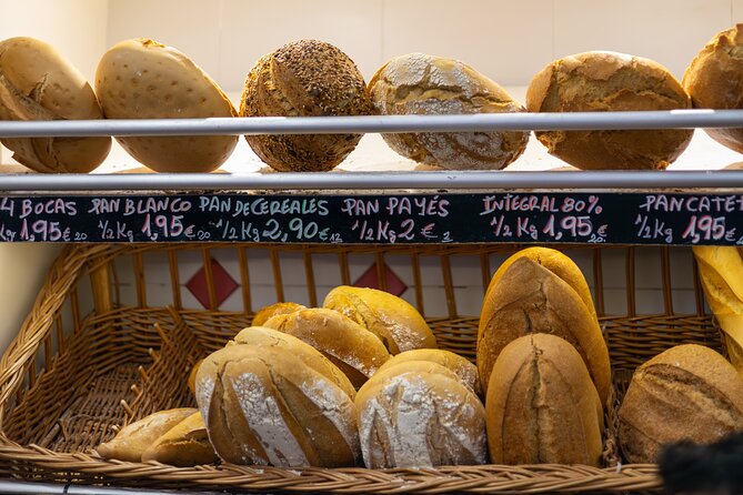 Malaga Food Tour with 12+ Tastings: Tapas, Olive Oil, Ham & More - Drinks Included: Vermut, Wine, Beer, and How to Pace
