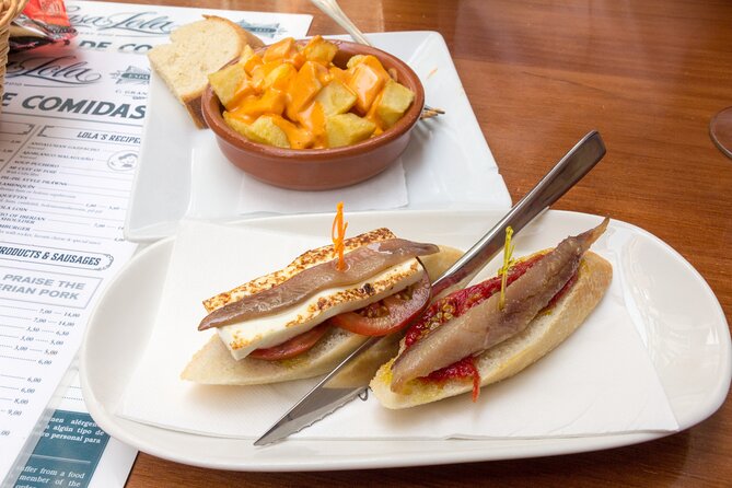 Malaga Market Food Tour: Tapas, Drinks, and Local Flavors - Key highlights