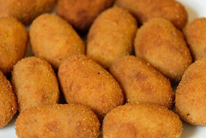 Malaga Market Food Tour: Tapas, Drinks, and Local Flavors - Stop 3: near the Picasso zone—tapas with serious local choices