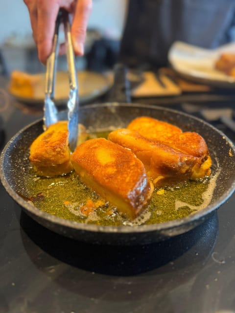 Malaga: The Ultimate Tapas Workshop with Market Visit - Kitchen setup in Soho District: same cooking goal, different timing
