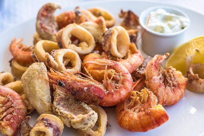 Marbella Food Tour: Tapas, Drinks and Delights with a Local - Stop 4: Plaza de la Victoria for boquerones en vinagre and croquetas