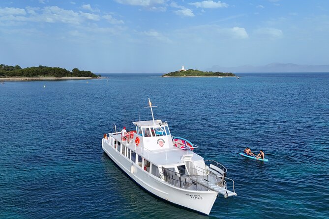 Morning Boat Trip in Alcudia with Swim Stop & Tapas - A classic 1968 boat sets the tone fast