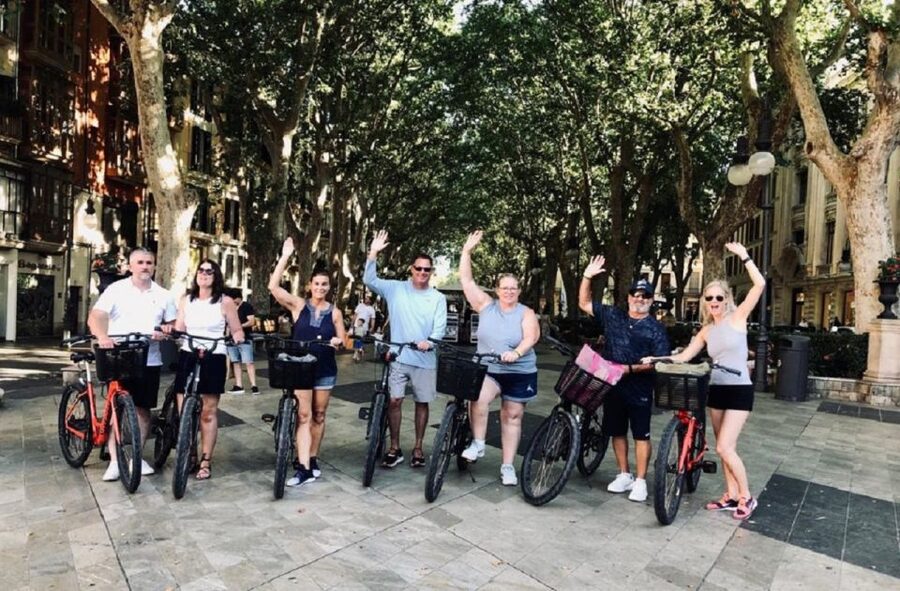 Palma de Mallorca: Guided Bicycle Tour with Tapas & a Drink - The Lonja de Mallorca finish area: turning toward ports and neighborhoods