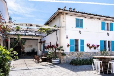 Palma: Distillery Tour with 3 Spirits and Tapas Tasting - Where you start: the courtyard at Bodegas Suau