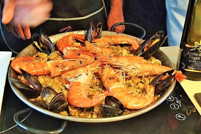 Premium Paella Cooking Class & 10 Spanish Tapas - Wine at the Table: Social, but Still Tied to Food