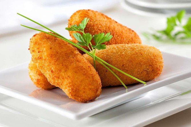 PREMIUM TAPAS TOUR: Tapas, Paella and Winery - Plaza del Siglo: the fish stop with show cooking