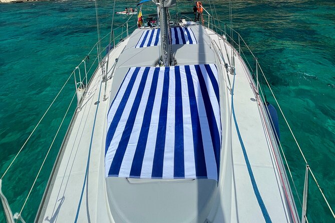 Private sailing with Paella and Tapas in Palma - Swimming, snorkeling, and paddle surf: the included gear that changes the day