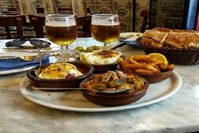 Private Tapas Tour (Only your group will participate) - Plaza de la Villa to Calle del Arenal: the churros-with-chocolate finale