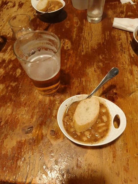 Santiago: Guided Foodie Tour with Drinks, Tapas & Live Music - Alex’s stories connect the food to Santiago and the Camino