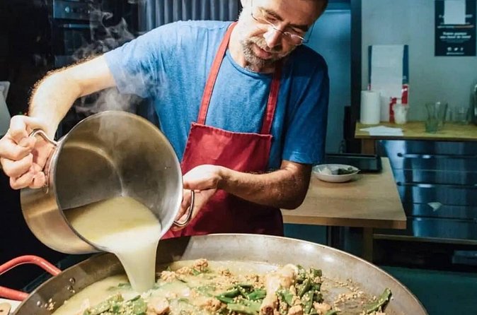 Seafood Paella Maestro with Tapas and Sangria - What about the guide: licensed, hands-on, and patient by design