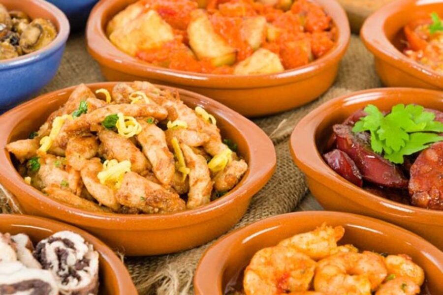 Seville: 3-Hour Tapas Tour by Bike - What you get to eat and drink: tapas plus an actual meal