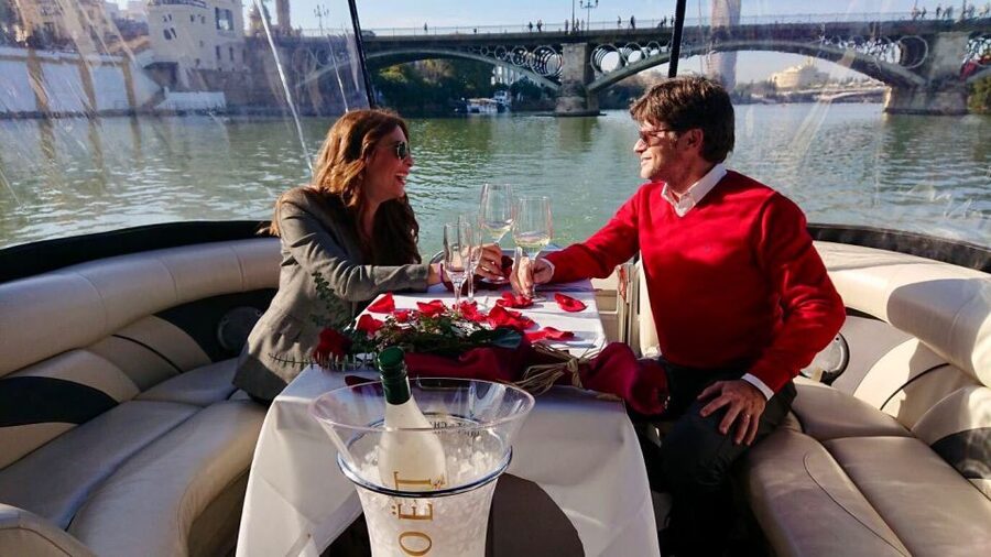 Seville: Exclusive River Boat Tour with Tapas - Getting Onboard: Triana Jetty, Isabel Bridge II, and Quick Taxi Tips