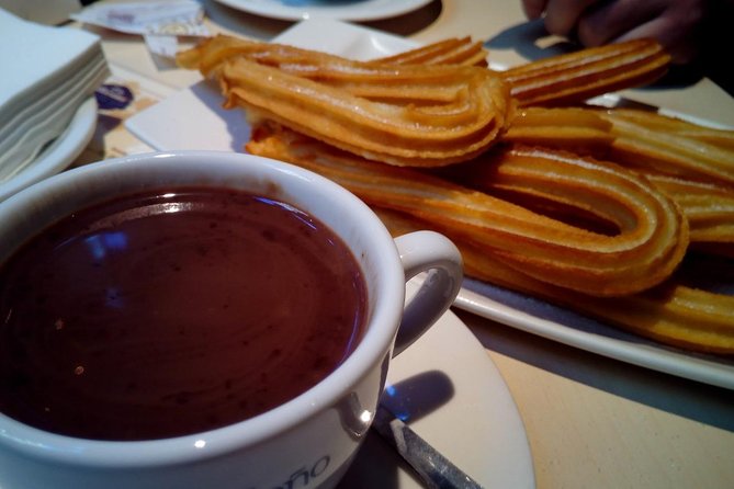 Seville Food Tour: Tapas, Drinks and Delights with a Local - Near the Cathedral and Giralda: Montadito de Pringá in Landmark Territory