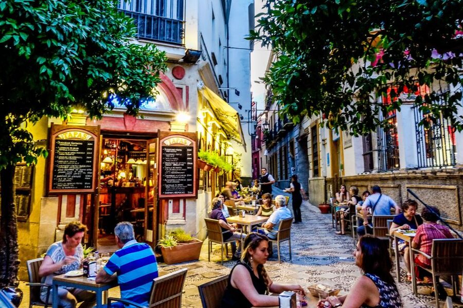 Seville: Half-Day Flamenco & Tapas Night - Three taverns and Spanish wine: how the tapas pace works
