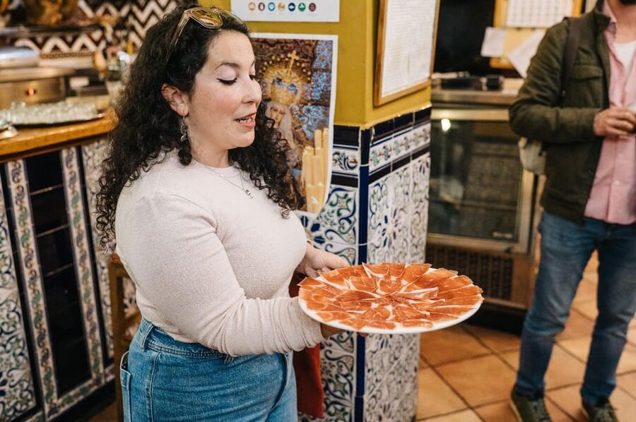 Seville: Private Tapas & History Tour in Triana Neighborhood - Getting started at Los Especiales near Puente de Isabel II