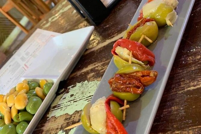 Seville Vegan Tapas Food and Market Walking Tour - The sunny river views: a short stroll that resets your brain (and your photos)