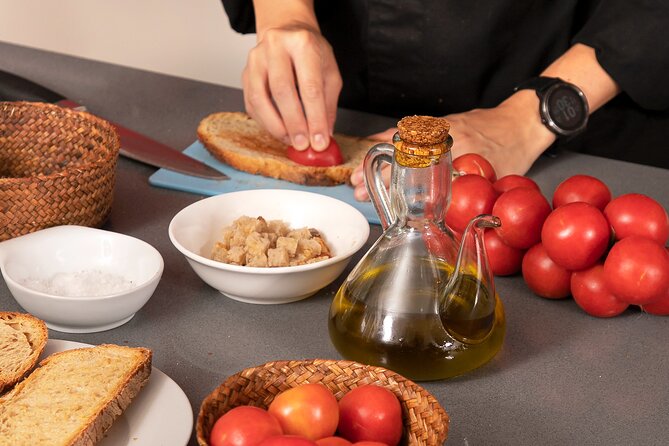 Spanish Tapas Workshop: Boqueria Tour & Rambla Views - Enjoying your meal with Las Ramblas views and unlimited wine