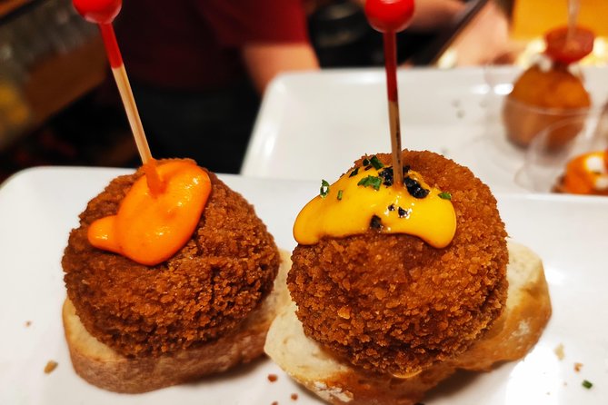 Spanish Wine and Tapas Tour in a Local Neighborhood in Barcelona - Stop 2 in El Poble Sec: four bars, one connected storyline