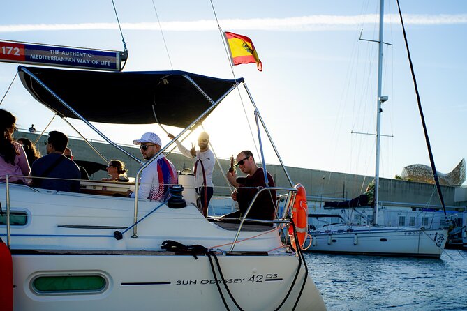 Sunset Sailing Experience w/ Live Spanish Guitar & Spanish Tapas - Entering Barcelona from the Mediterranean side