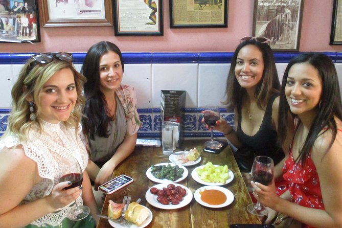 Tapas and history tour ending with churros with chocolate - Puerta del Sol meeting point and the history you’ll notice immediately