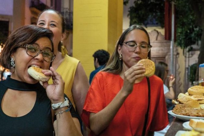 Tapas and Wine Tasting Tour in Seville Small Groups and Jewish Quarter - Walking Into Seville’s Cathedral Area and the Archivo De Indias