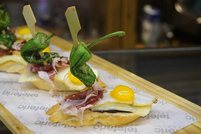 Tapas like a local Private Tour in Barcelona - What’s actually included: pinxos, a main, and Catalan dessert