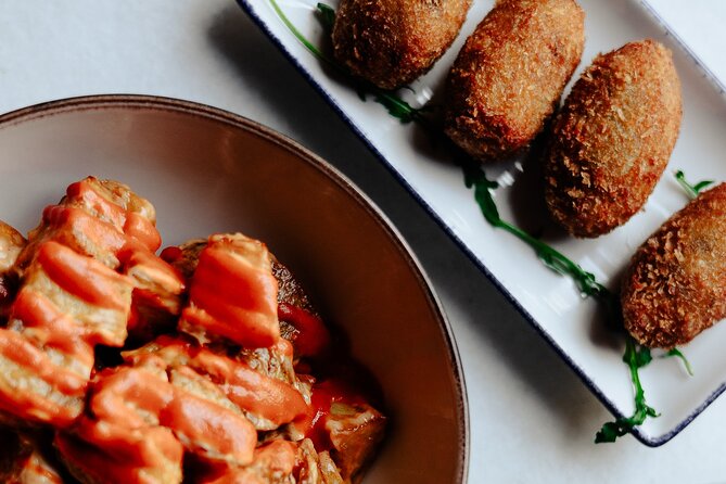 Tapas & Paella Experience | 3 Local places | Meet Travelers - Stop 2: Two Spanish Traditional Tapas for Extra Variety