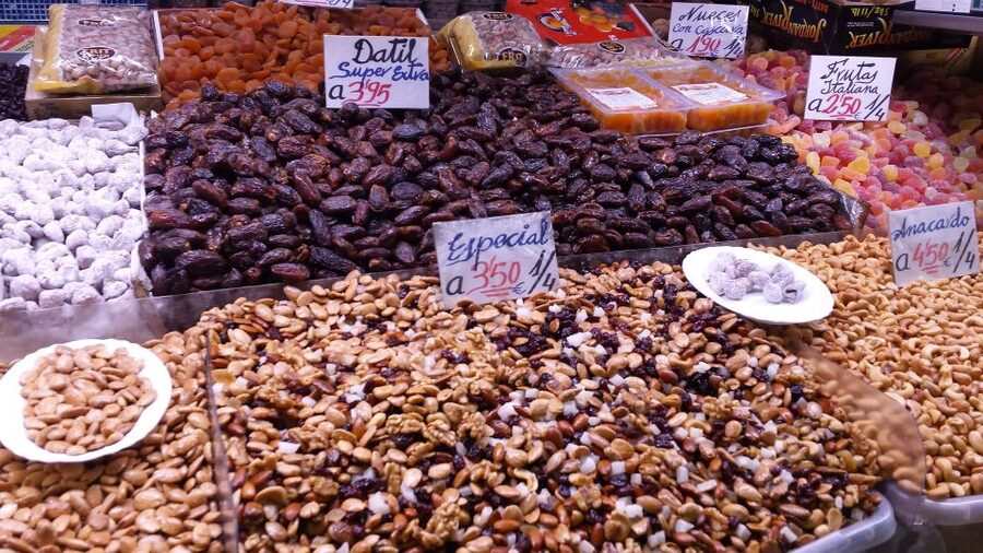 Tapas Tour Paella and Malaga market with Official Guide - Stop 1: Wine and local snacks at the historic tavern