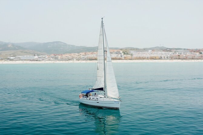 Tarifa Sailing and Snorkeling Excursion with tapas and drinks - Snorkeling near the island with masks, scooter, and wetsuit options