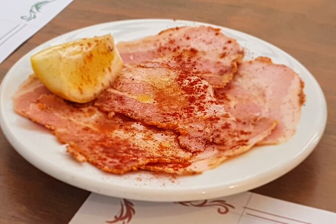 Taste of Malaga Tour : Tapas, History and Local Customs - The Alcazaba-area finale: reimagined Malaga dishes with Spanish wine