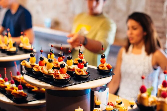 Tasty Tapas & Drinks Tour with a Rooftop Included - Meeting Point at Tirso de Molina, Then You Keep Walking