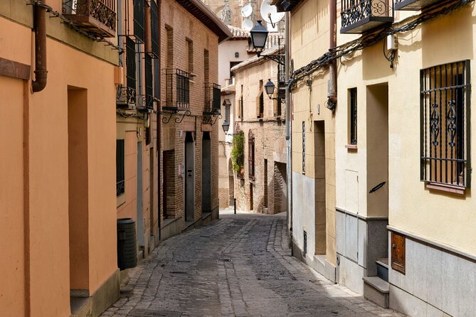 Toledo Full Day with Winery Visit, Tapas and Wine Tasting - Synagogue Santa María la Blanca: arches, identity, and timing