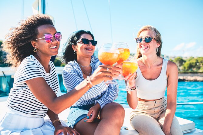Traditional Mallorquin Llaut Cruise with Tapas and Drinks - Sun, tapas, and a llaut cruise: the vibe from Palma Bay
