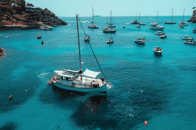 Traditional Mallorquin Llaut Cruise with Tapas and Drinks - Captain Joan’s style: easygoing, clear, and safety-conscious