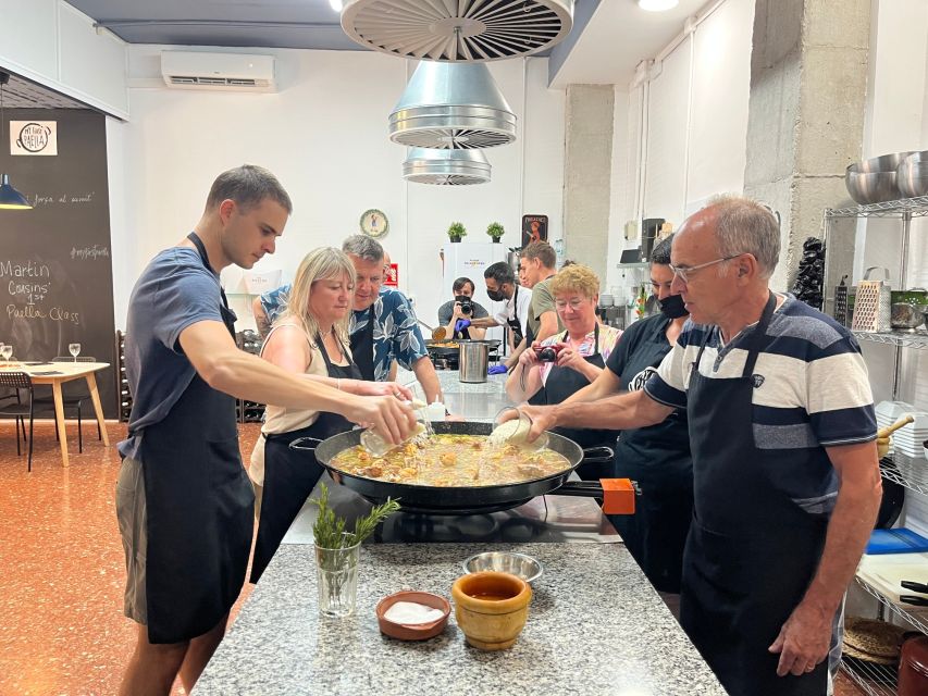 Valencia: Evening Guided Paella Workshop, Tapas, and Drinks - What you learn at the stove with local chefs
